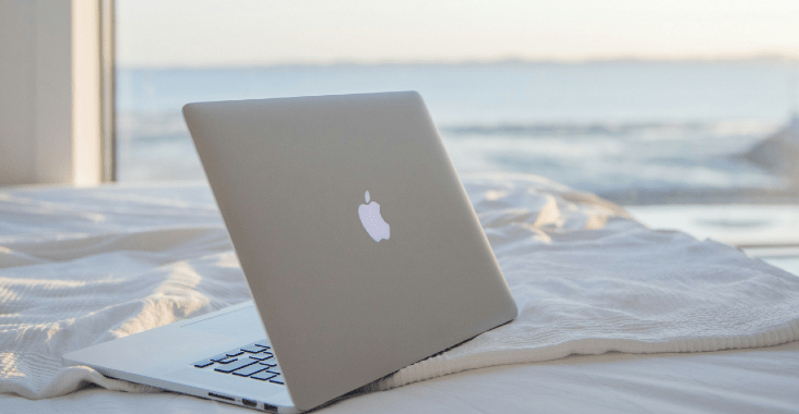Laptop in front of the sea